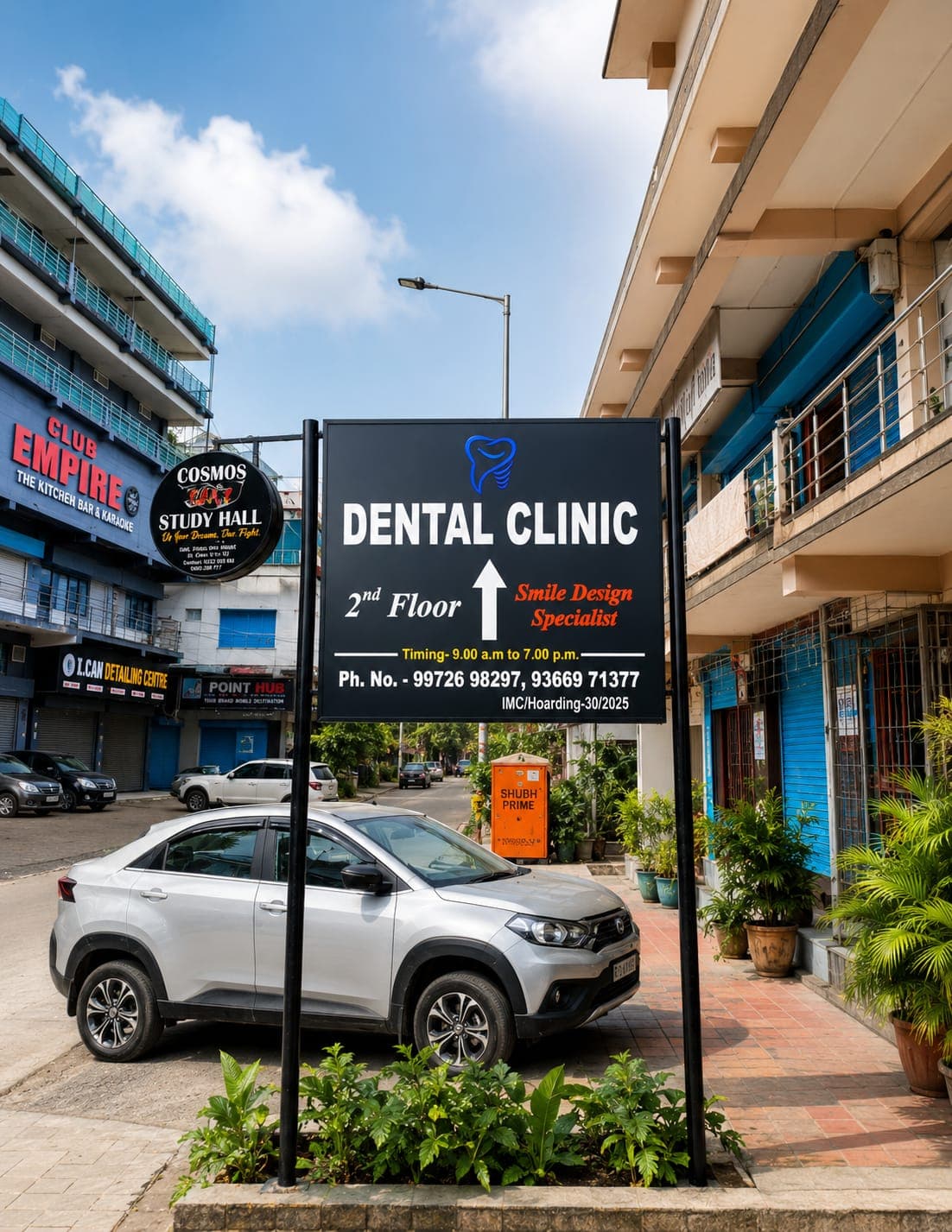DentX Smile Clinic signboard outside the building